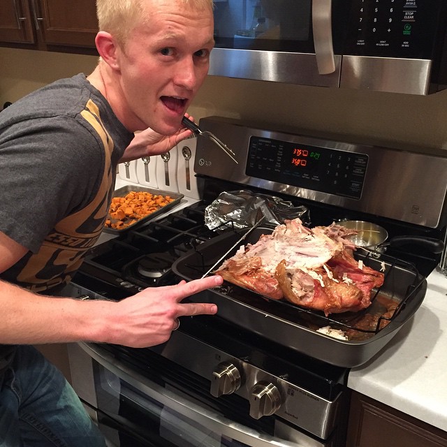 The turkey (@kipdenver) attempts to carve the turkey.