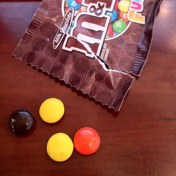 This is all that came out of a pack of M&Ms. Sign of the economy? :)