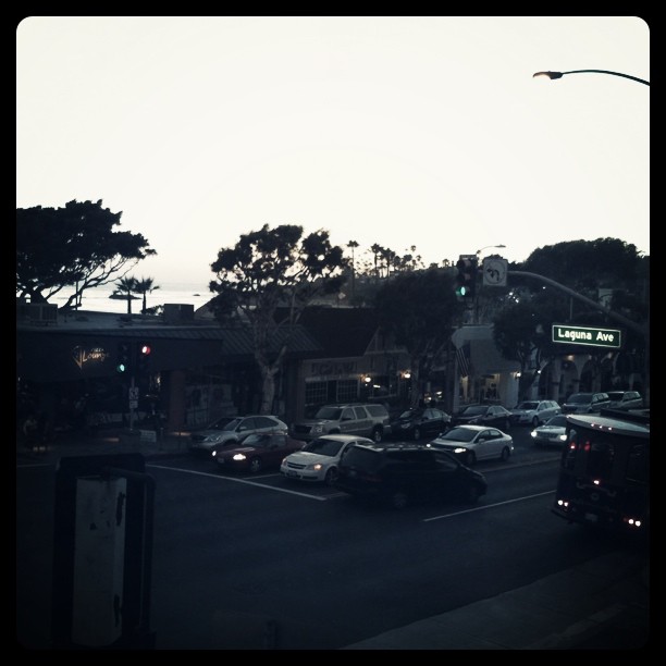 Dinner on a private balcony at sunset overlooking the beach and Laguna Ave. 