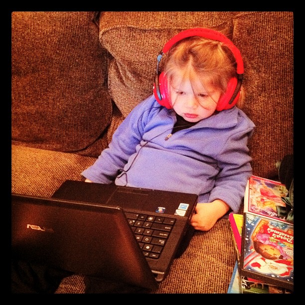 Rocking the pink headphones