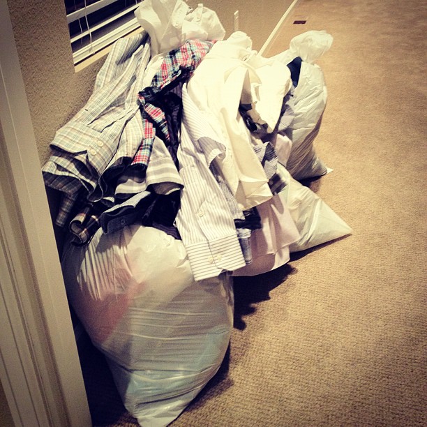 Four bags of clothes that are too big