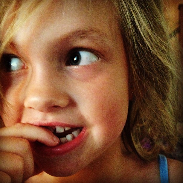 Sophie shows off her loose tooth