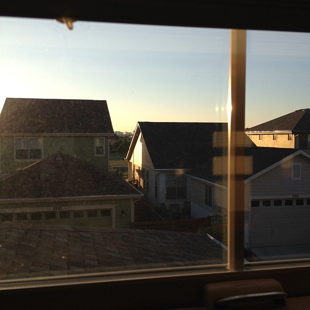 View out my window. Hospital in view between two houses is where many shooting victims were taken. Pray for them.