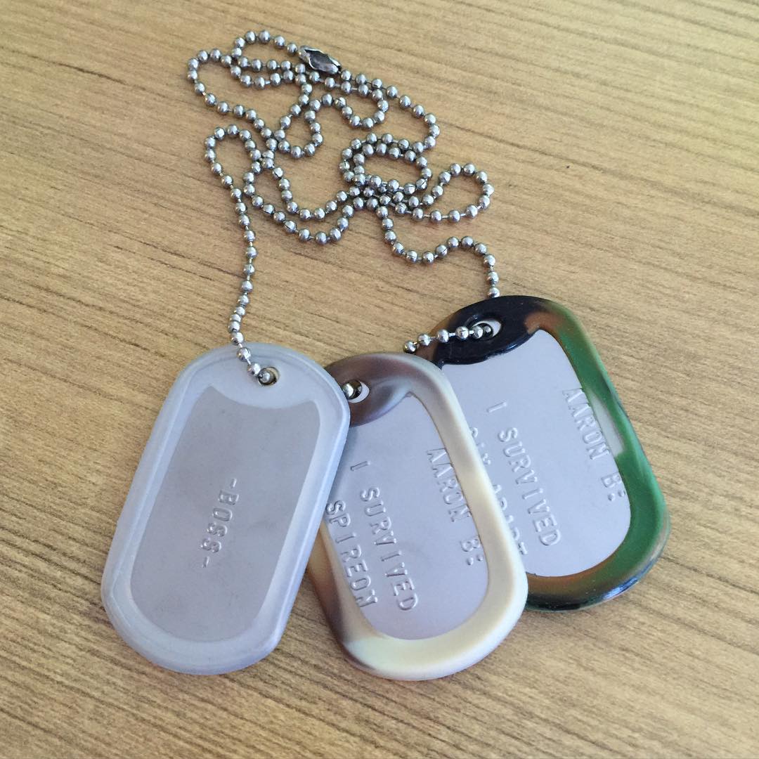 Celebrating project launches and other accomplishments with dog tags. The team each got one with customized tags.