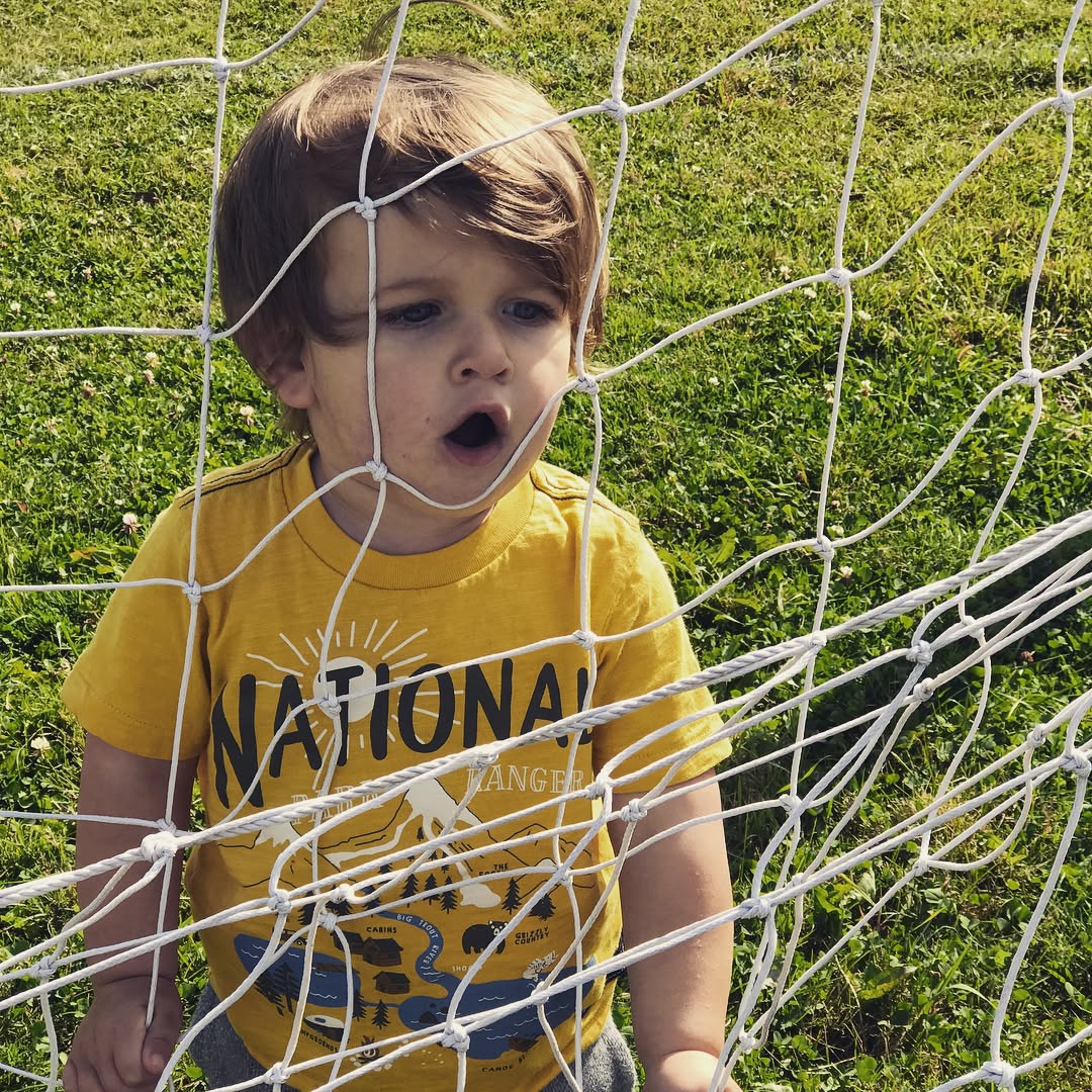 It's soccer season and Gavin has already scored a bunch of goals. Meanwhile Henry is playing goalie.