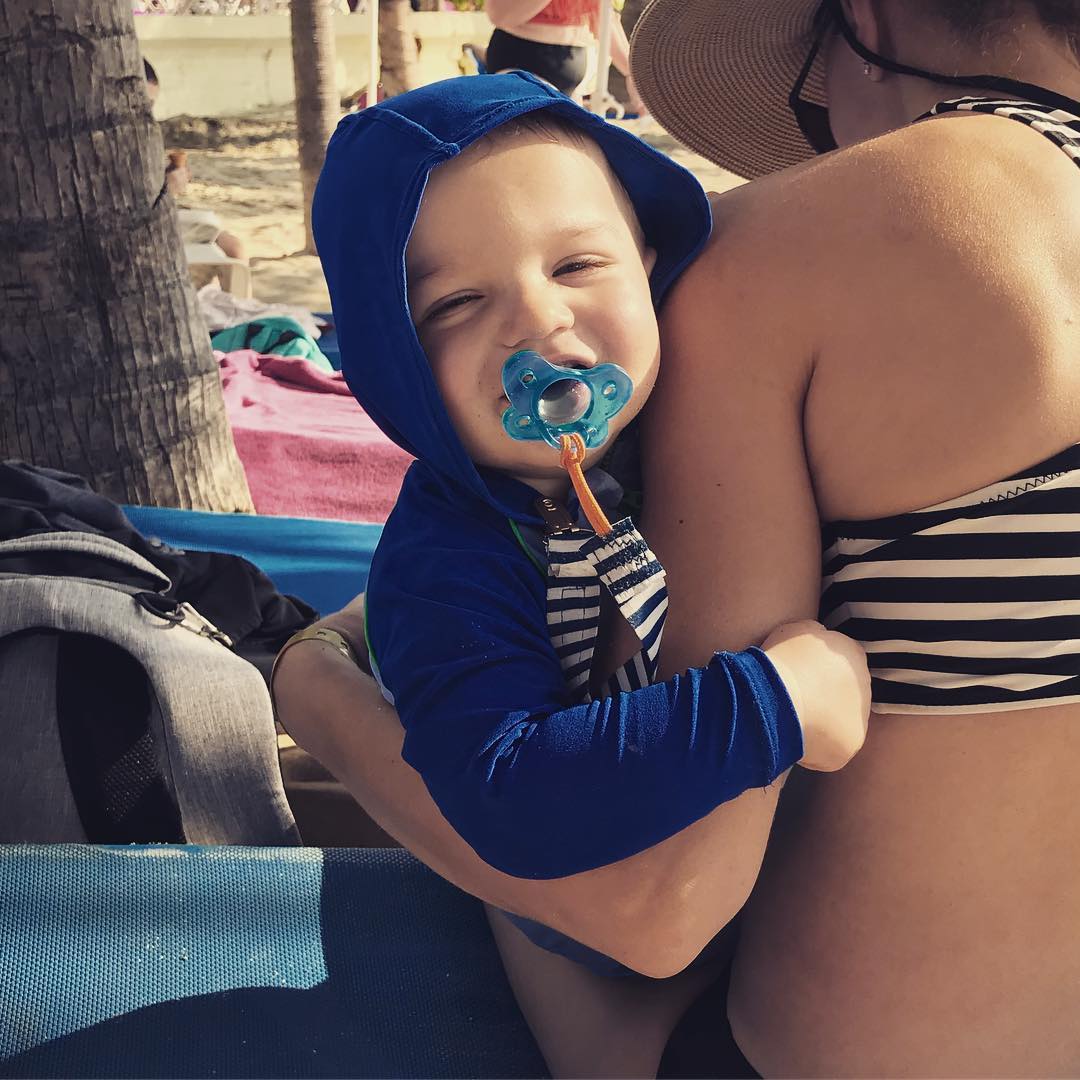 This little dude inherited his godfather Aaron’s distaste for the beach. Here’s a rare happy photo from this week.
