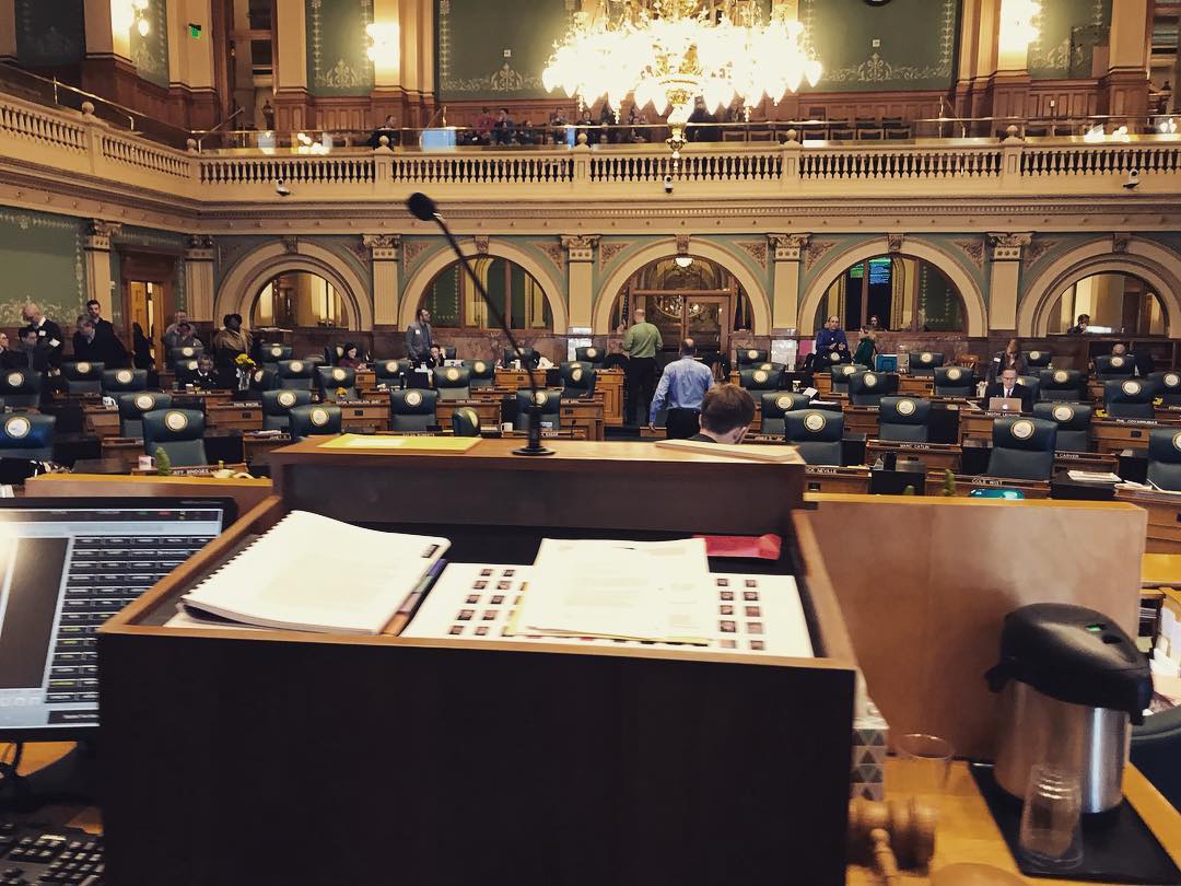 Hanging out at the Colorado State House speaker’s podium. Should I push the buttons?